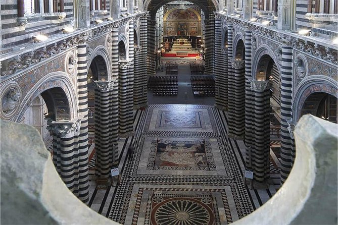 Discover the Medieval Charm of Siena on a Private Walking Tour - Battistero di San Giovanni: The Incomplete Upper Story and Its Meaning