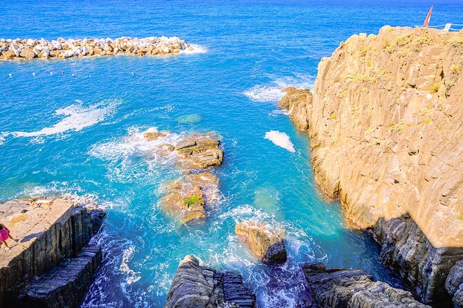 Florence: Cinque Terre Park Day Trip with Optional Street Food - Riomaggiore in golden hour mode, then back to La Spezia