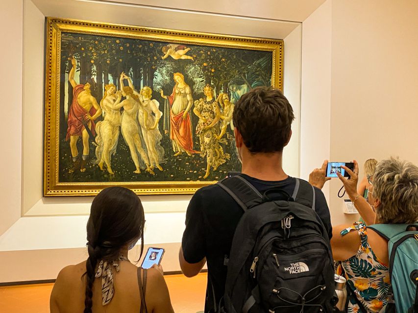 Florence: Fast-track Uffizi Gallery Hosted Tickets - Finding Your Host at the Giotto Statue (ItalyPass Tours)