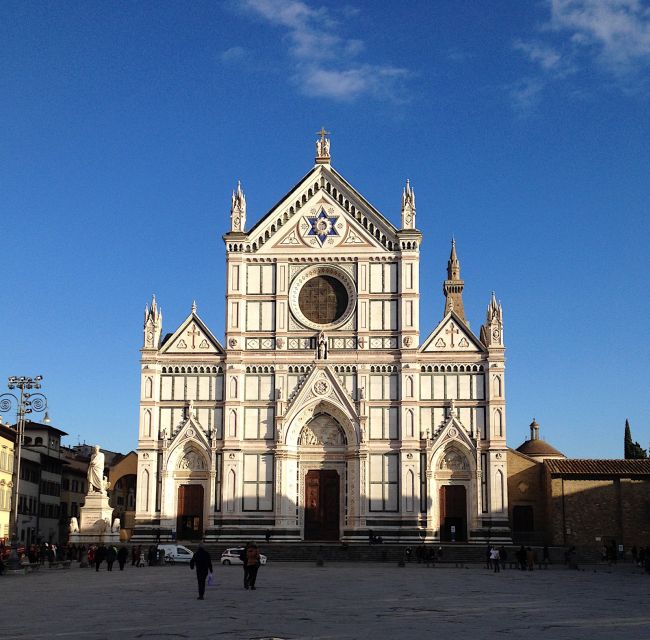 Florence: Guided Walking Tour with Entry to Santa Croce - Inside Santa Croce: Giotto Frescoes, Donatello, Brunelleschi, and the 1966 Scars