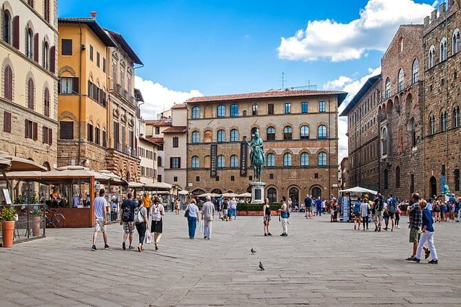 Florence in a Day: David, Cathedral & City Highlights Guided Tour - Piazza della Signoria, Uffizi Views Outside, and the Medici Story