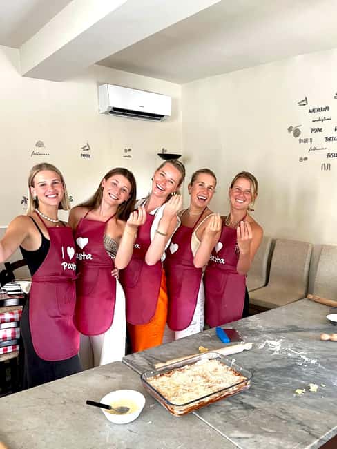 Florence: Lasagna and Spaghetti-Making Class - Building béchamel and assembling lasagna in classic Italian layers