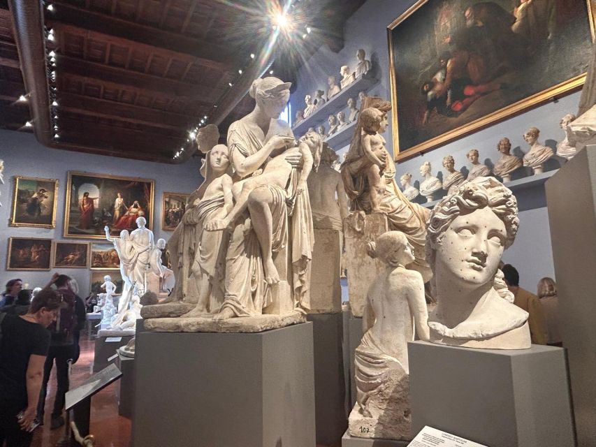 Florence: Michelangelo's David Entrance Ticket and Audio App - The pickup spot: Carrefour Express and the white-flag handoff