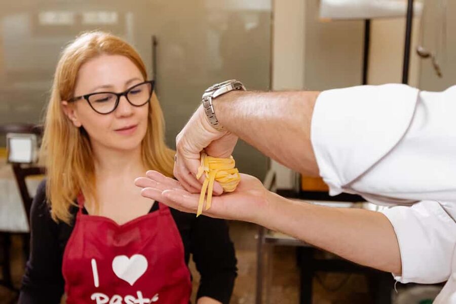 Florence: Pasta Class with Wine, Limoncello and Dessert - Step inside the Florence palace, apron on, pasta in hand