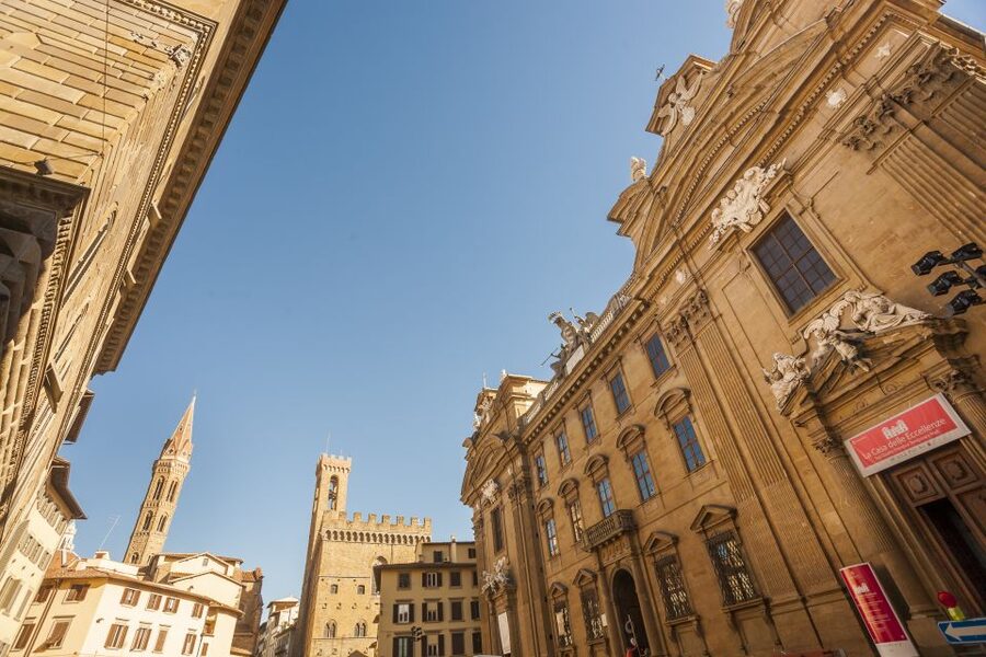 Florence: Private Walking Tour of Florence's Hidden Gems - Via de’ Tornabuoni fashion streets and Strozzi Palace exterior style
