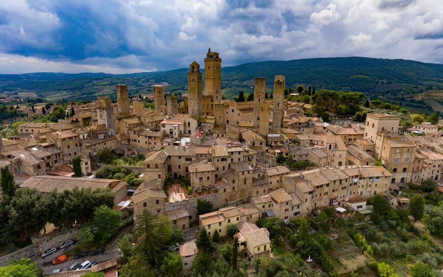 From Florence: PRIVATE Trip to Pisa, San Gimignano, & Siena - San Gimignano towers and Piazza della Cisterna