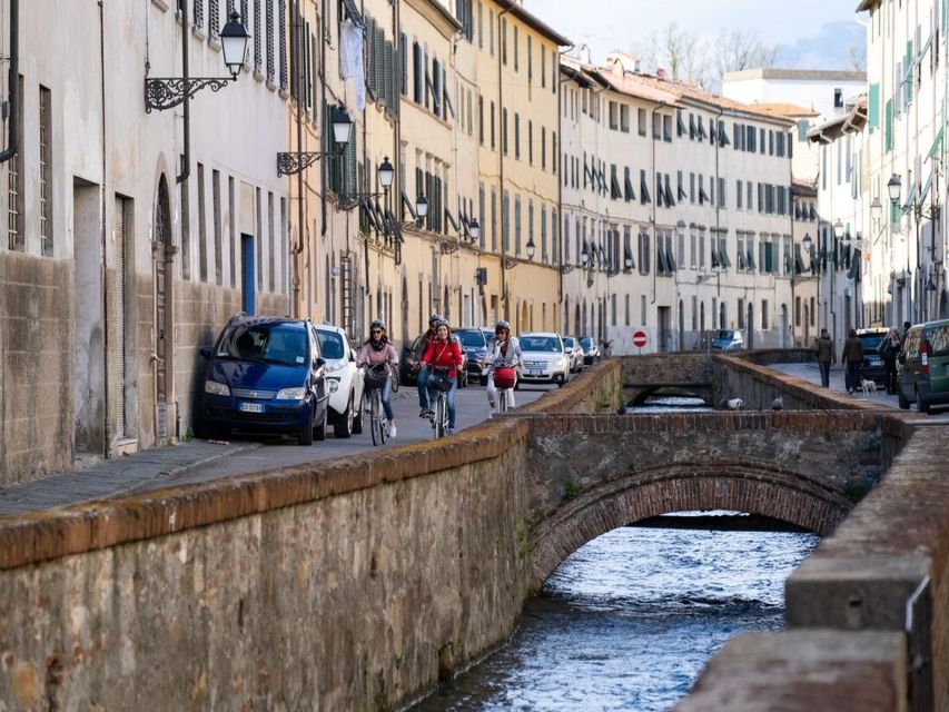 Lucca: 3-Hour Bikes & Bites Foodie Adventure like a Local - The first food stop: cured meats, pecorino, Tuscan bread, and olive oil