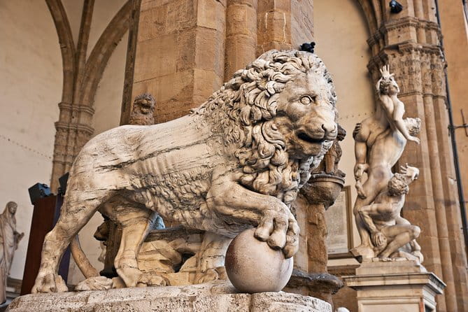Skip-the-Line Florence Highlights and David Walking Tour - Ponte Vecchio to Piazza della Signoria: the political heart, in stone